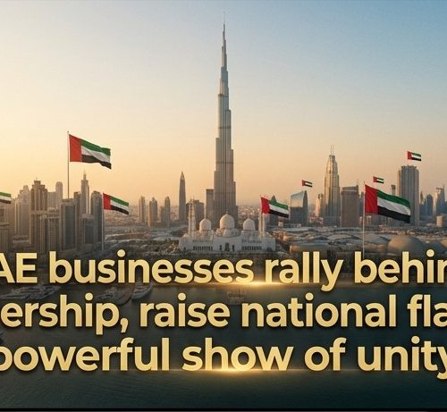 UAE national flag waving over Dubai skyline at golden hour during historic business unity moment April 2026